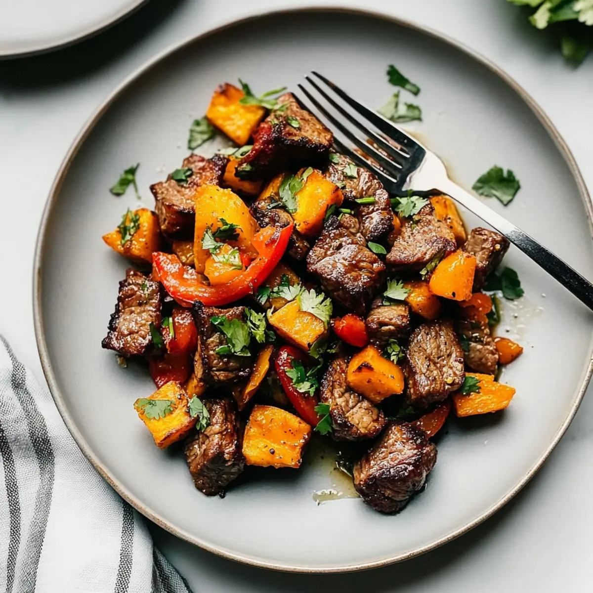 Steak Bites with Sweet Potatoes and Peppers